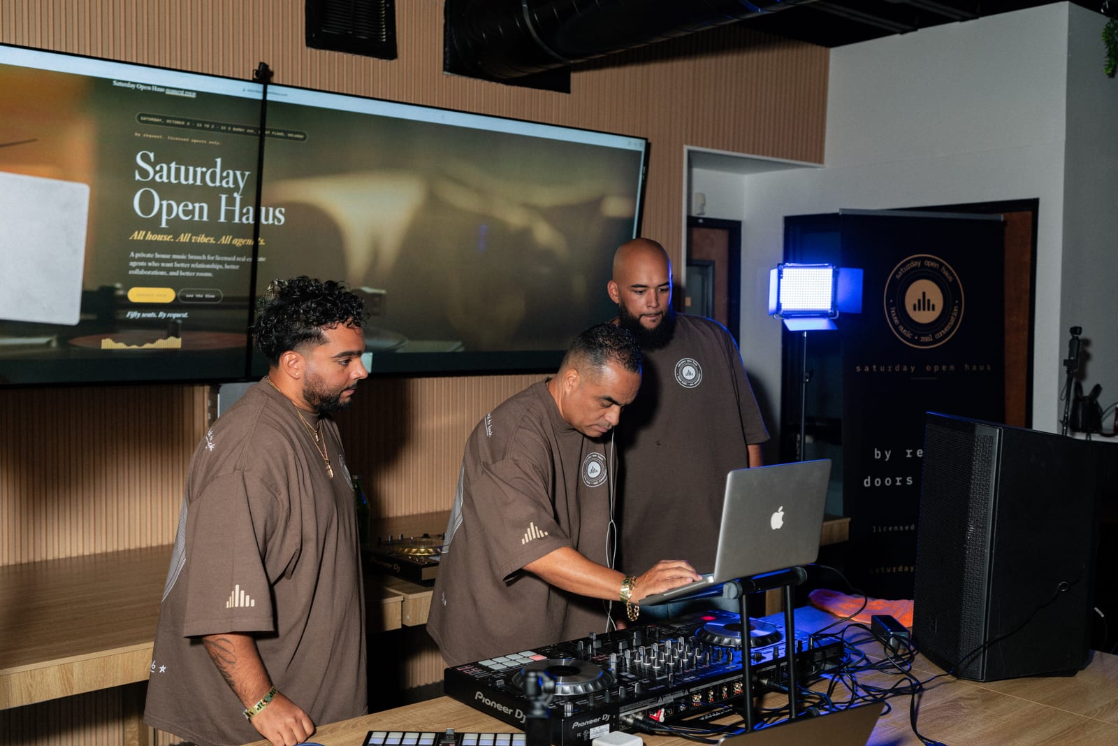 Gino and Victor at the decks under the Saturday Open Haus screen